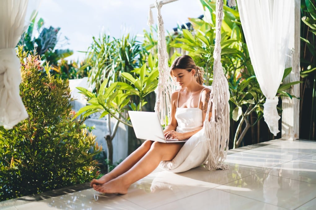 “Hush trips” – secretly going to work remotely – are a hot travel trend, but there are pros and cons to them. And what if your boss finds out? Photo: Shutterstock