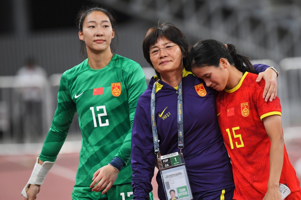 Head coach Shui Qingxia (centre) admits there is a gap in skills and plans to focus on training the new generation. Photo: Xinhua