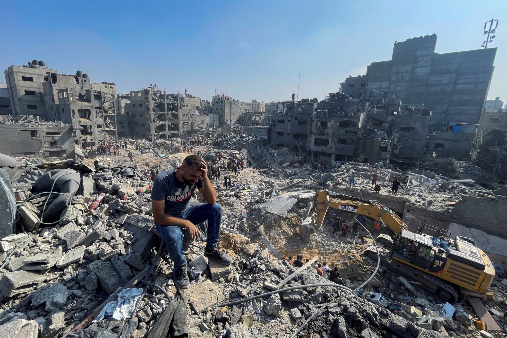 A man reacts as Palestinians search for casualties on Wednesday after Israeli strikes on the Jabalia refugee camp in the northern Gaza Strip. Photo: Reuters