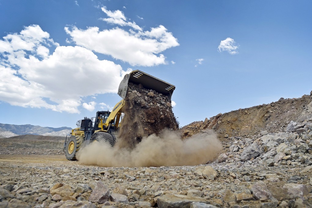 A loader moves material inside the open pit at Molycorp’s Mountain Pass Rare Earth facility in Mountain Pass, California. Reopening the largest rare earth mine in the country is just one way the US is trying to establish its own rare earth supply chain. Photo: Reuters