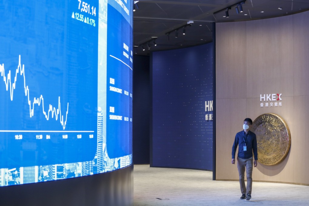 A man walks through Connect Hall at the headquarters of Hong Kong Exchanges and Clearing in Central on July 8, 2022. Photo: Jonathan Wong