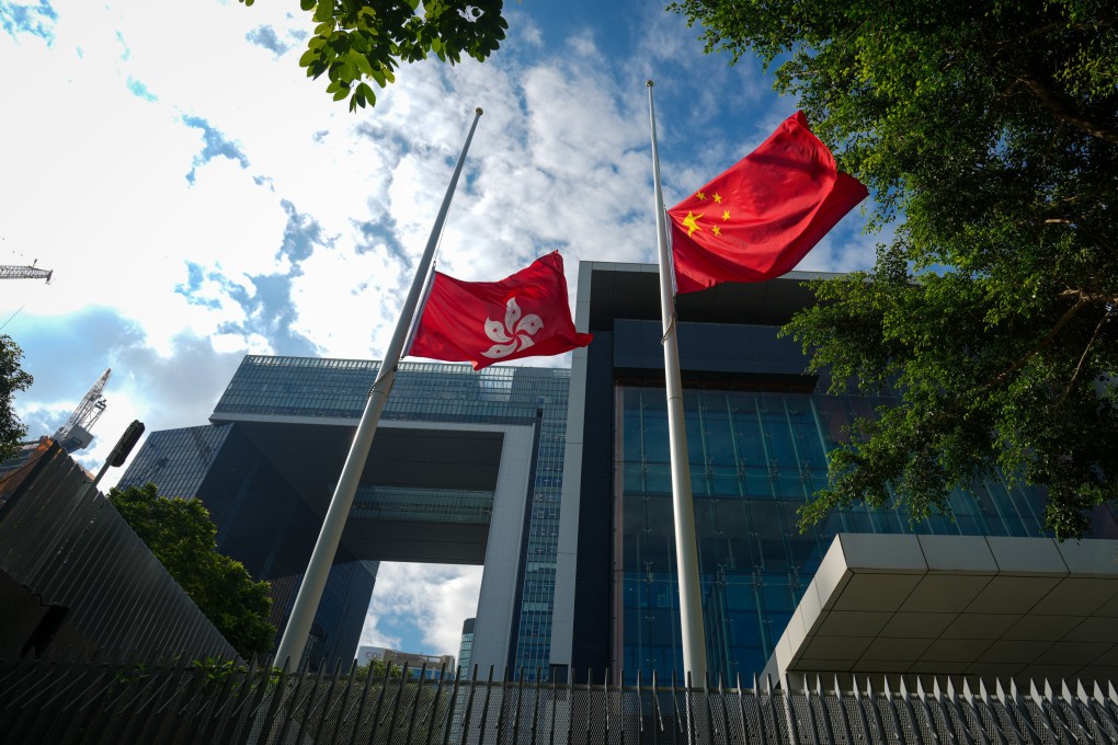 The city and country flags are flying at half-mast at Tamar. Photo: Sam Tsang