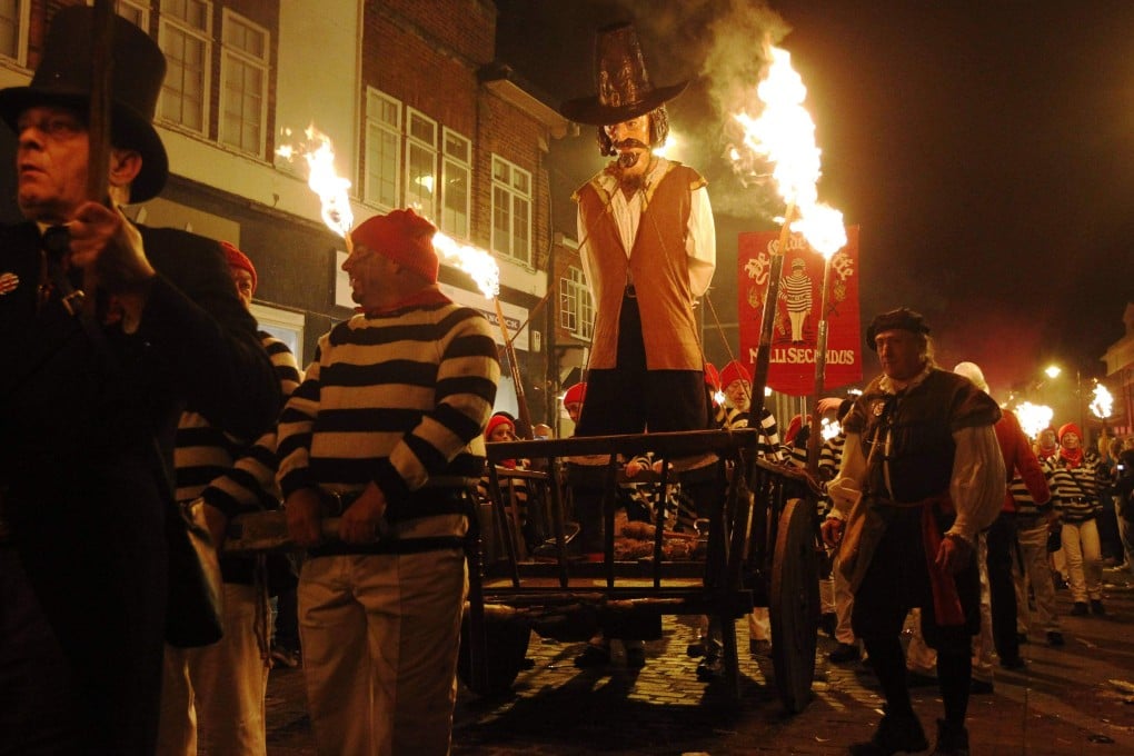 Participants in costume process with an effigy of Guy Fawkes, to be burned, as they take part in one of a series of processions during Bonfire Night celebrations in Lewes, southern England to mark the uncovering of Guy Fawkes’ “Gunpowder Plot” to blow up the Houses of Parliament in 1605. Photo: Reuters