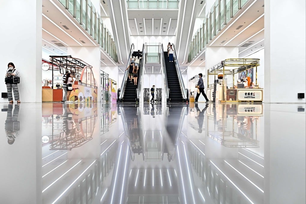 People walk inside a near-empty shopping centre in Bangkok last month. Thailand could face prolonged challenges from weak growth and stagnating demand in Northeast Asia. Photo: AFP
