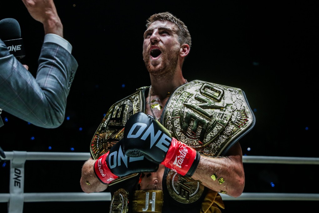 Jonathan Haggerty celebrates becoming a two-sport champion. Photos: ONE Championship