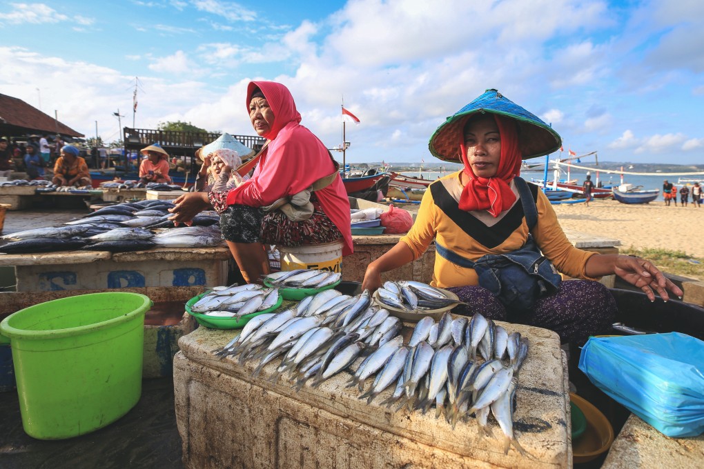 Women sell fish in Bali, Indonesia. Photo: Shutterstock