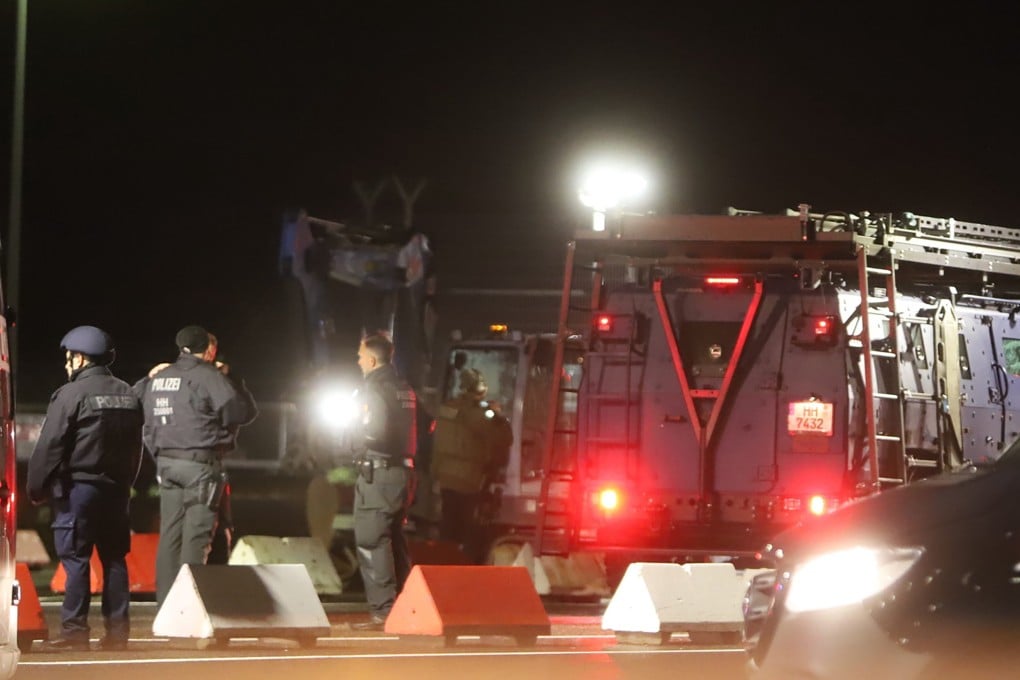Special police arrives at the airport in Hamburg, Germany on Saturday after an armed man in a vehicle broke through security. Photo: EPA-EFE