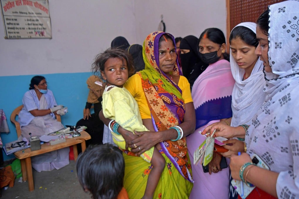 Pregnant women and mothers wait for their turn to see an Auxiliary Nurse Midwife health worker at a state-run rural health centre in a village in India. Gender equality also saw its worst slump in two decades, with ‘stark gender biases’ still prevailing across the region, especially for women in poor households. Photo: AFP
