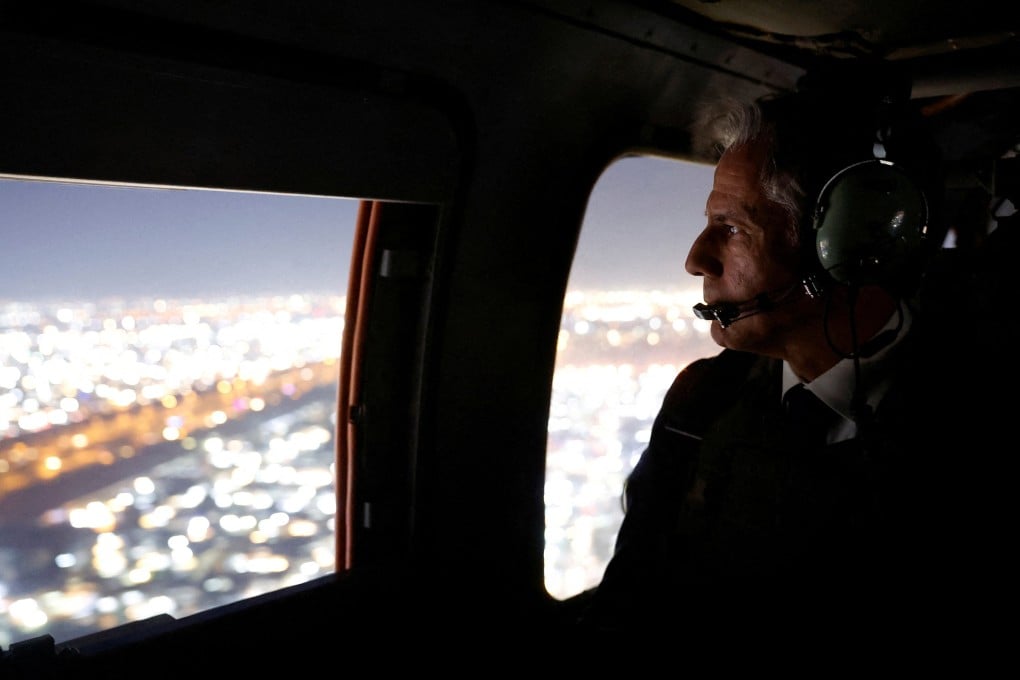 US Secretary of State Antony Blinken in a helicopter after meeting Iraqi Prime Minister Mohamed Shia al-Sudani in Baghdad. Photo: Reuters