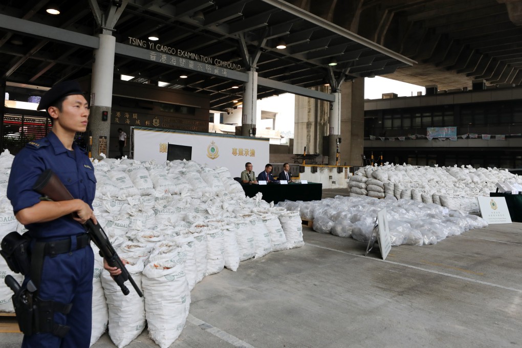Hong Kong customs officers display the bags containing the suspected Ice on Monday. Photo: Xiaomei Chen