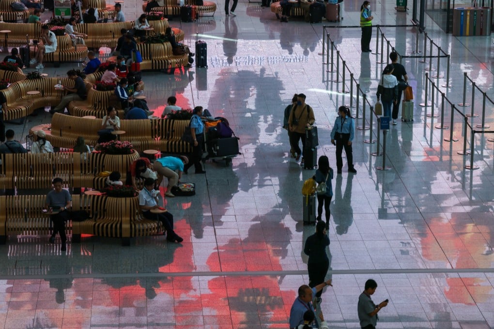 An artwork is reflected on the floor of the Hong Kong International Airport on October 5, as part of the airport’s art and culture festival. The airport has a digital twin project that seeks to optimise operations by creating a virtual replica of itself. Photo: May Tse
