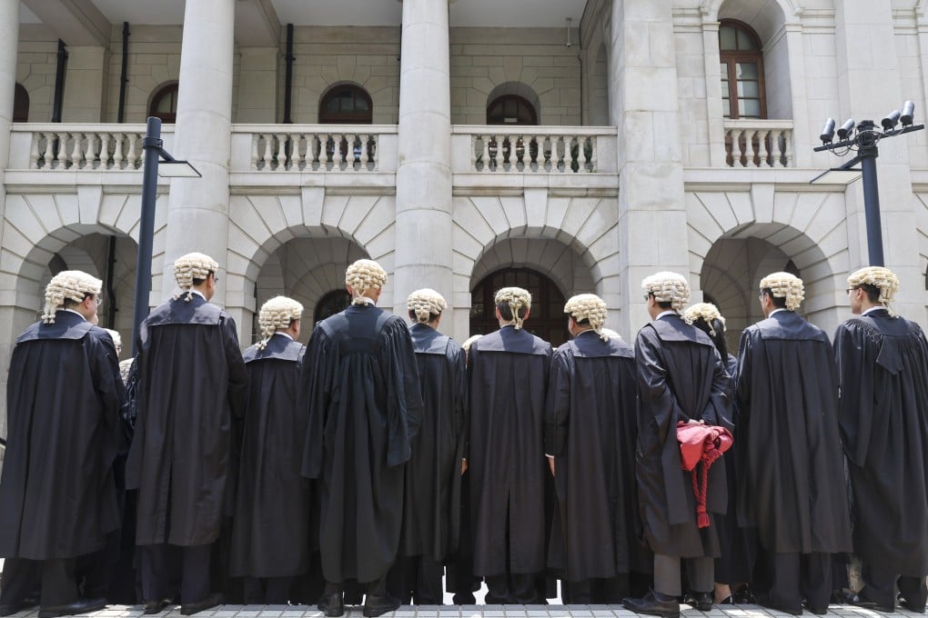 Barristers pose for a group photo after an appointment ceremony at the Court of Final Appeal building in Central on May 20. In the latest Rule of Law Index, Hong Kong was ranked 23rd out of 142 jurisdictions, ahead of the US, at 26th. Photo: Yik Yeung-man