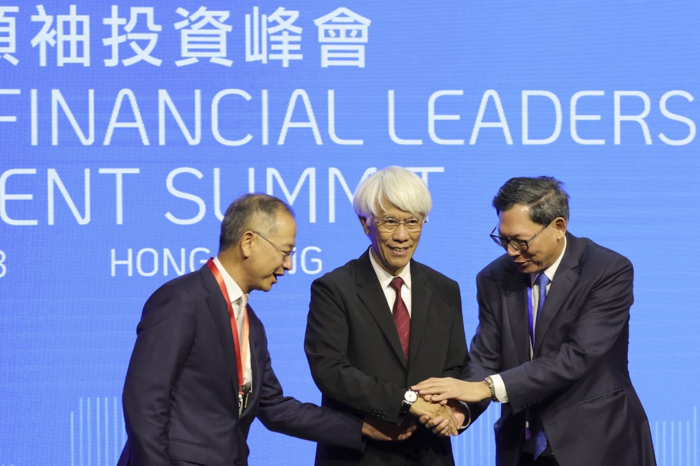 (From left) Eddie Yue, Joseph Yam and Norman Chan, the current and former CEOs of HKMA, take part in a special fireside chat at the Global Financial Leaders’ Investment Summit on Tuesday. Photo: May Tse