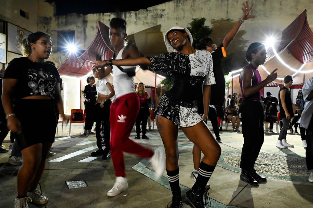 Young Cuban K-pop fans dance at the San Fan Con square in Havana. Photo: AFP