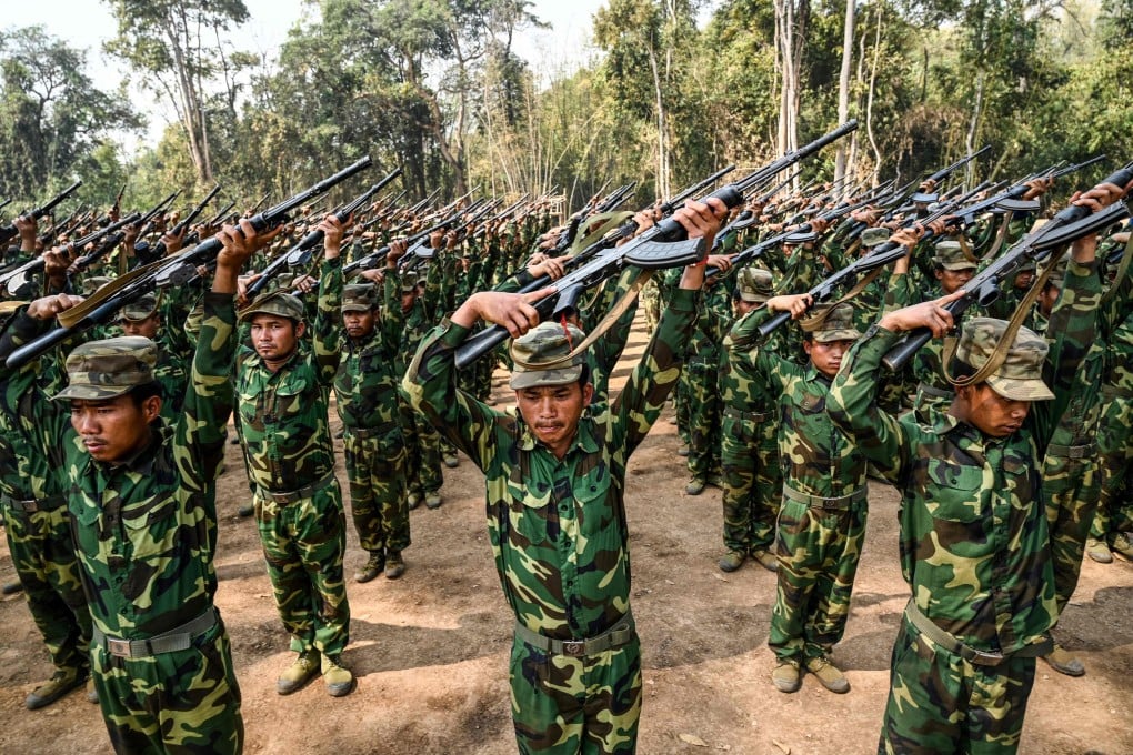 Members of the Ta’ang National Liberation Army train at their base camp in the forest in Myanmar’s northern Shan State. Photo: AFP