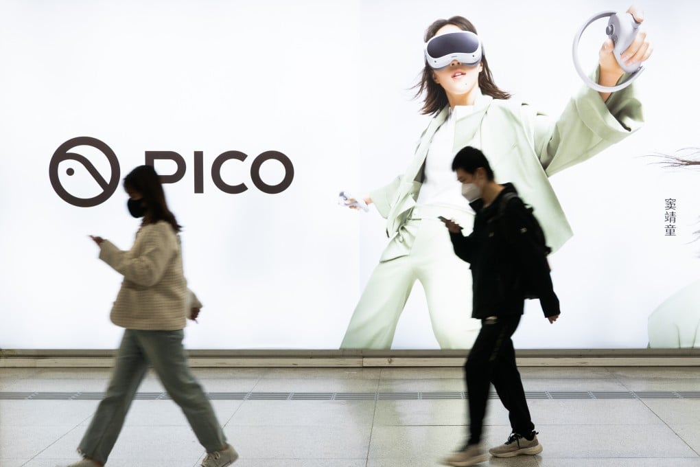 People pass by an advertisement for the Pico 4 virtual reality headset in Beijing on October 20, 2022. Photo: Shutterstock