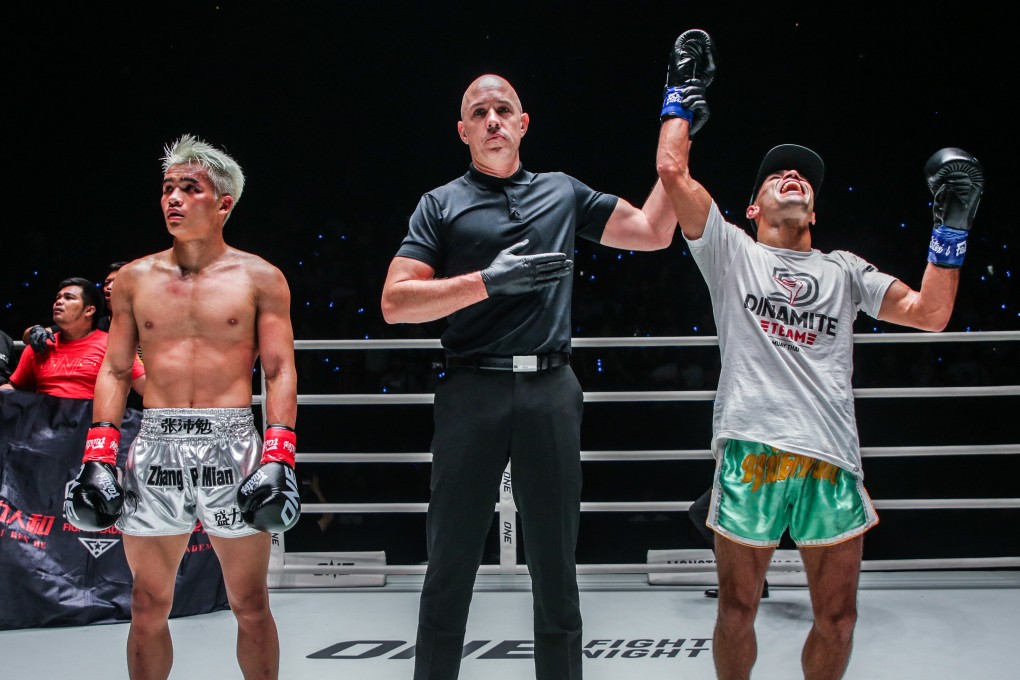Rui Botelho celebrates after a split decision win over Zhang Peimian. Photos: ONE Championship