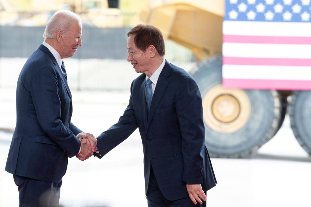 US President Joe Biden shakes hands with TSMC chairman Mark Liu at a “first tool in” ceremony at the TSMC facility under construction in Phoenix, Arizona, on December 6. Photo: Bloomberg