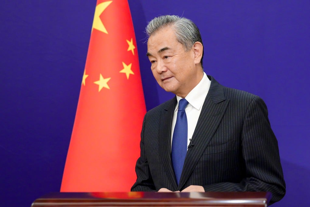Chinese Foreign Minister Wang Yi said maritime conflicts should be resolved through peaceful means. Photo: Handout