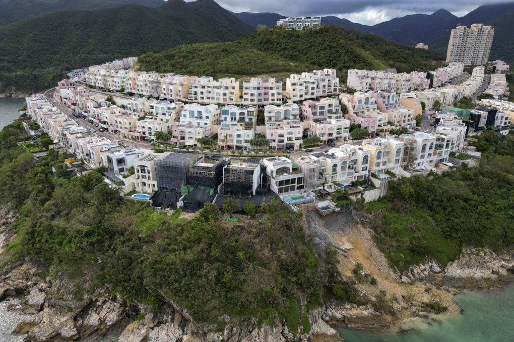 Damage from a landslide is seen at the Redhill Peninsula. Inspections of the houses there have uncovered many cases of Illegal structures or occupation of government land without permission. At least four owners have been slapped with removal orders. Photo: Sam Tsang