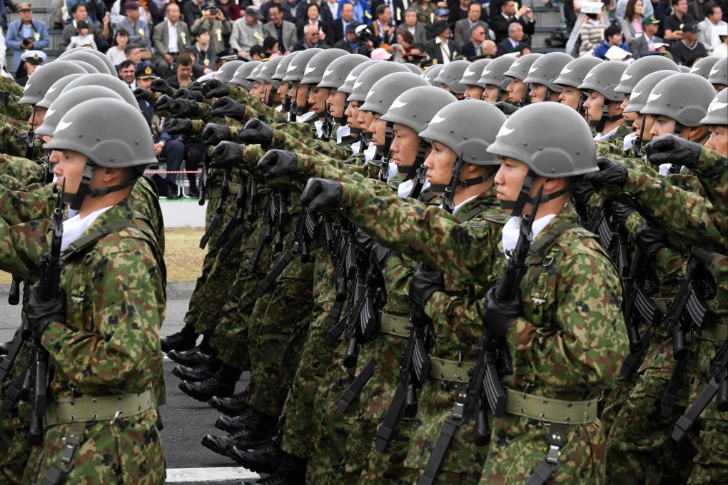 Under the Japanese constitution, the Self-Defence Forces can use only the minimum necessary force to defend the territory and population of Japan. Photo: AFP
