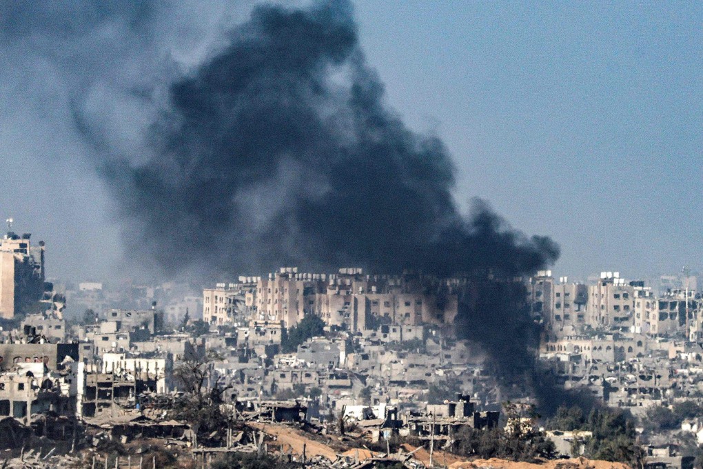 Smoke plumes billow during Israeli bombardment near a position along the border with the Gaza Strip. Airlines have been forced to take longer flights to avoid war zones like the one in Gaza. Photo: AFP