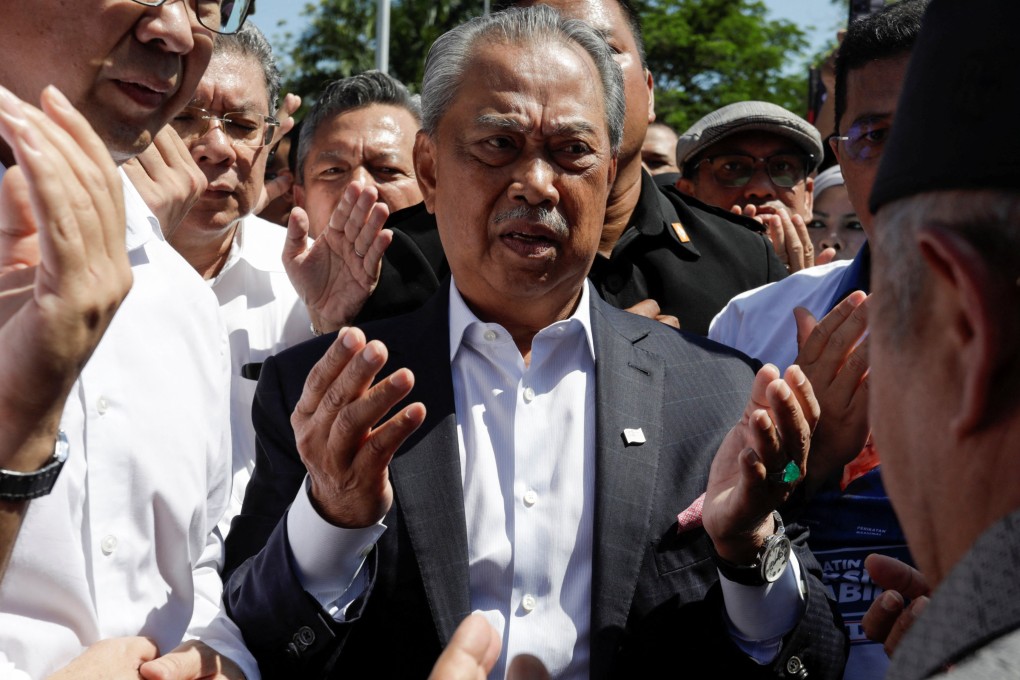 Muhyiddin Yassin says that members of his opposition party have been coerced to switch allegiance and back Prime Minister Anwar Ibrahim. Photo: Reuters