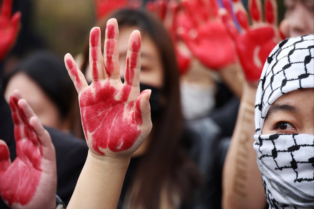 South Korean activists supporting Palestinians in Gaza attend an anti-US protest on Thursday during US Secretary of State Antony Blinken’s visit to Seoul. Photo: Reuters