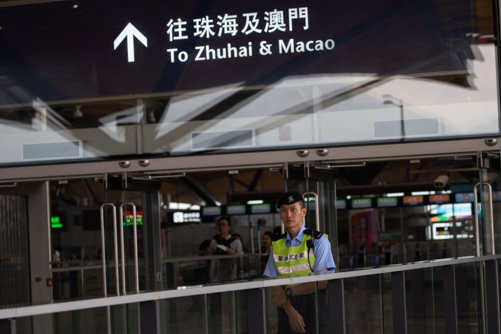 Signage in Hong Kong for passengers taking the bridge to Macau uses the spelling Macao, the same as that used on official documents everywhere except Portugal. Photo: EPA-EFE