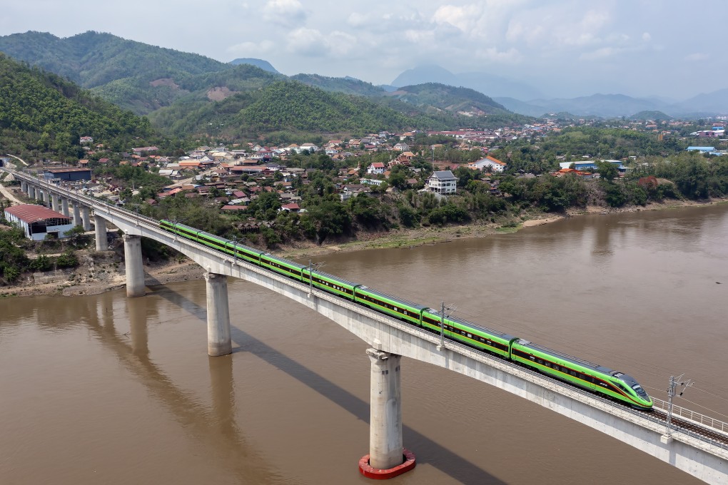 A train on the China-Laos railway crosses a bridge over the Mekong River in Laos on May 28. Difficult terrain, geopolitical uncertainty and a lack of connectivity are just some of the hurdles to securing investment in Southeast Asian countries’ railway networks. Photo: Xinhua