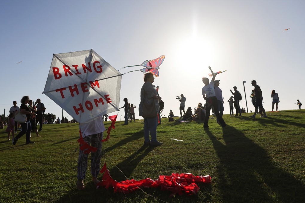 People take part in an event in Tel Aviv, Israel on Thursday, where they fly kites and demand the immediate release of hostages held in Gaza. Photo: Reuters