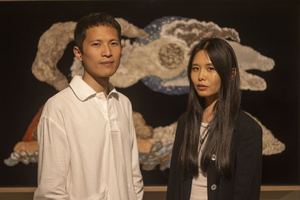 Artist duo Enzo Camacho and Ami Lien at Para Site in Hong Kong. Their new exhibition delves into the 1985 Escalante massacre in the Philippines, and also includes “phytograms”, large-scale drawings and a 16mm stop-motion animated film. Photo: Meredith Chen