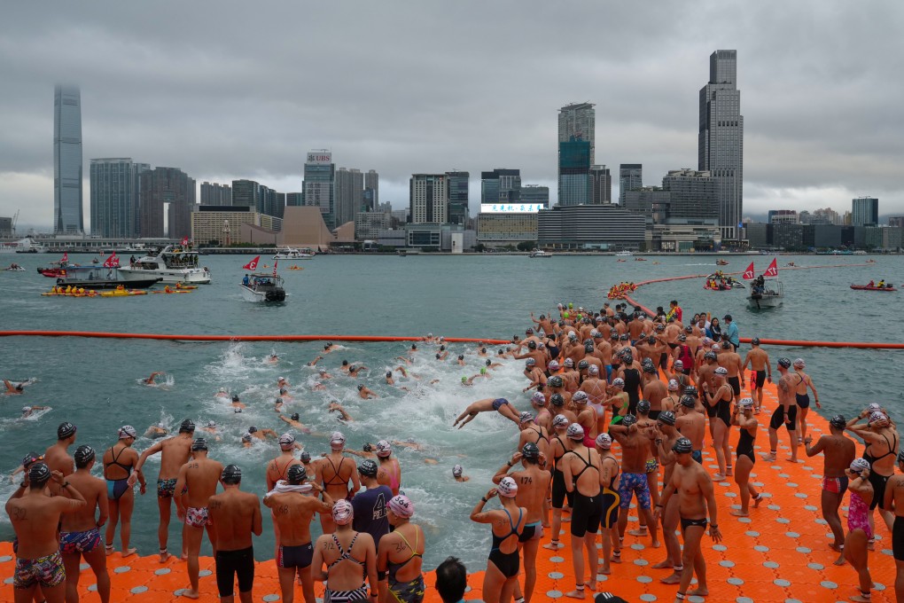 Swimmers prepare to start the New World Harbour Race from Wan Chai on Sunday. Photo: Sam Tsang