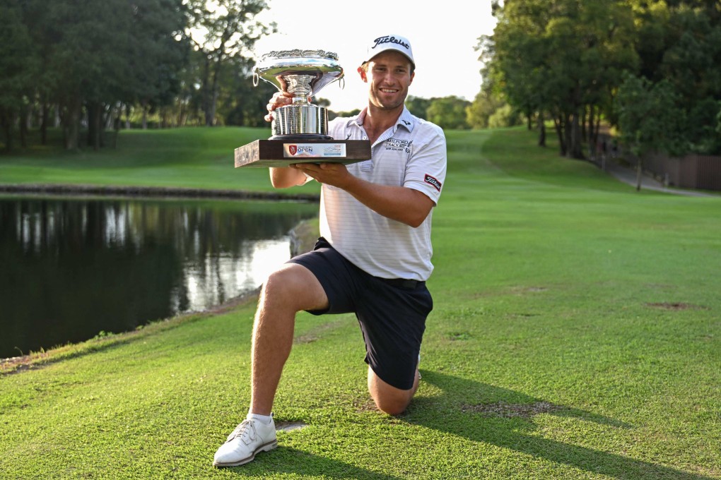 New Zealand’s Ben Campbell celebrates with the winner’s trophy after his victory in Fanling. Photo: AFP