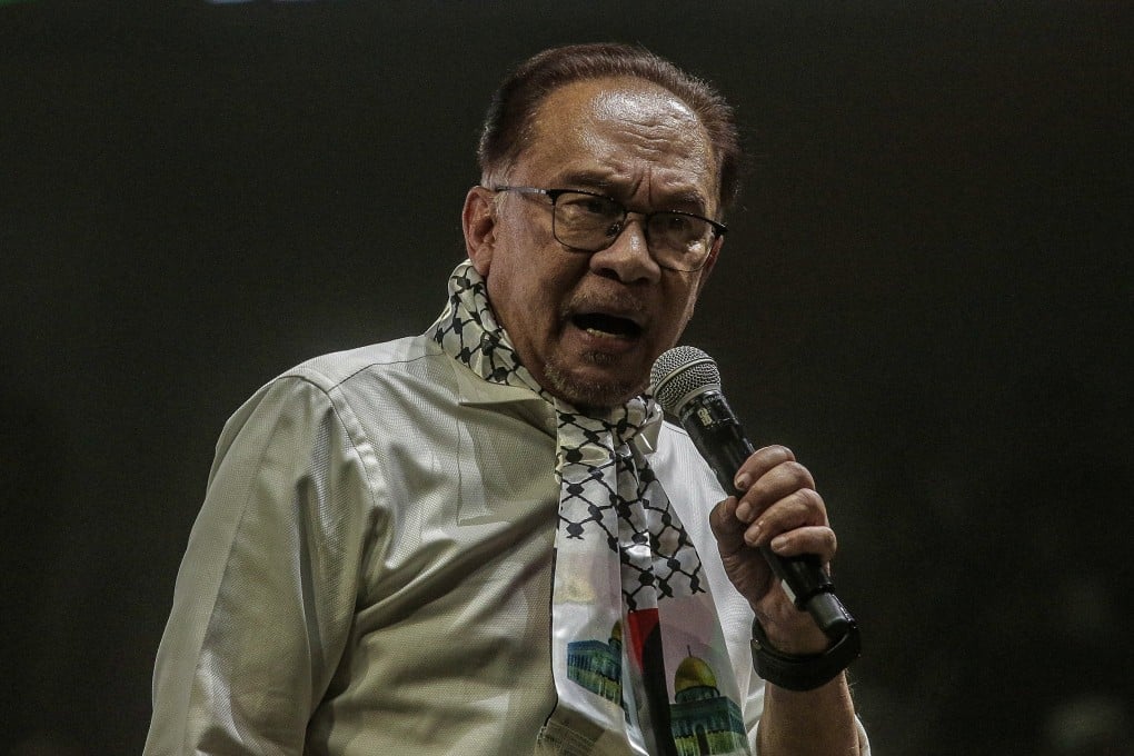 Prime Minister Anwar Ibrahim speaks at the ‘Malaysia Stands with Palestine’ rally in Kuala Lumpur on October 24. Photo: EPA-EFE
