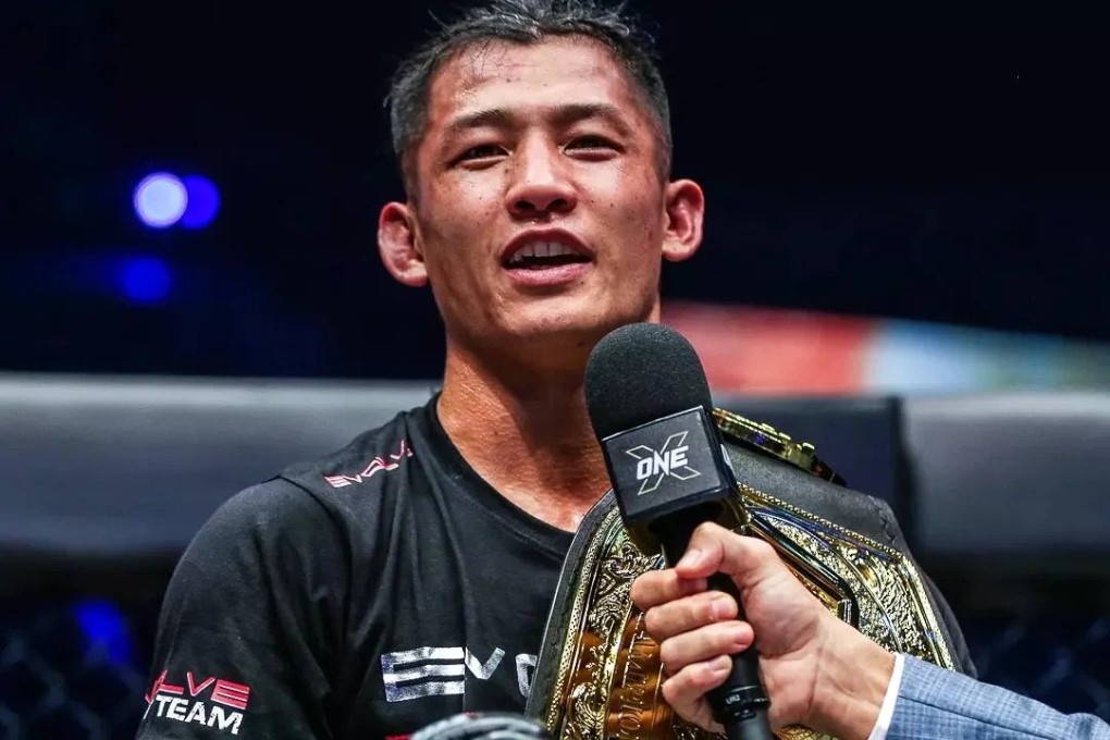 Hiroki Akimoto speaks to ONE Championship commentator Mitch Chilson after claiming the promotion’s bantamweight kickboxing belt in 2022. Photo: ONE Championship