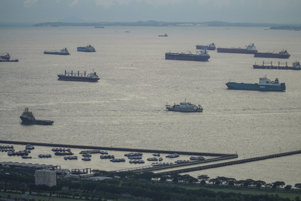Container and cargo ships at the Strait of Malacca. The Malacca Strait is one of the most important shipping lanes in the world. Photo: Roy Issa