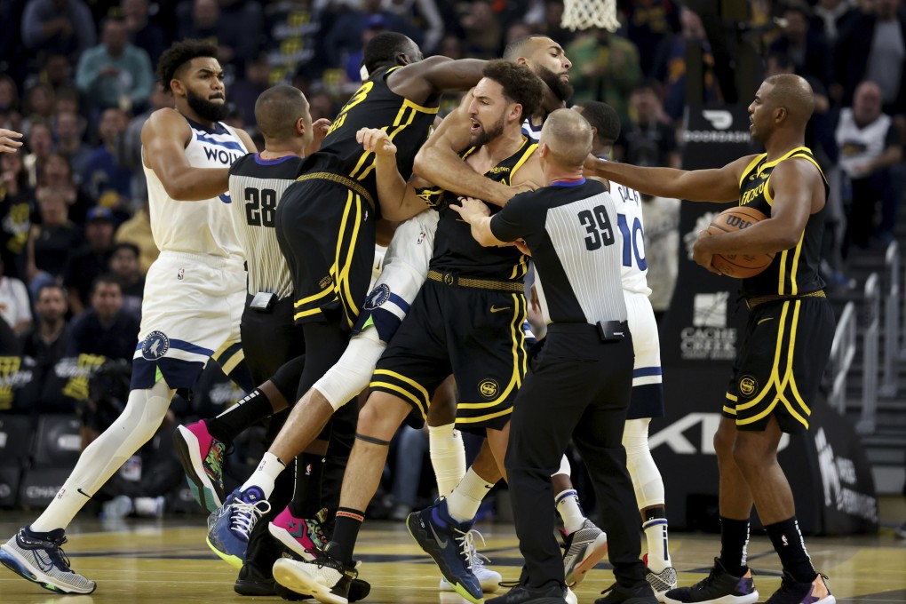 Golden State Warriors guard Klay Thompson, Draymond Green and Timberwolves Jaden McDaniels were ejected from the game two minutes in. Photo :AP
