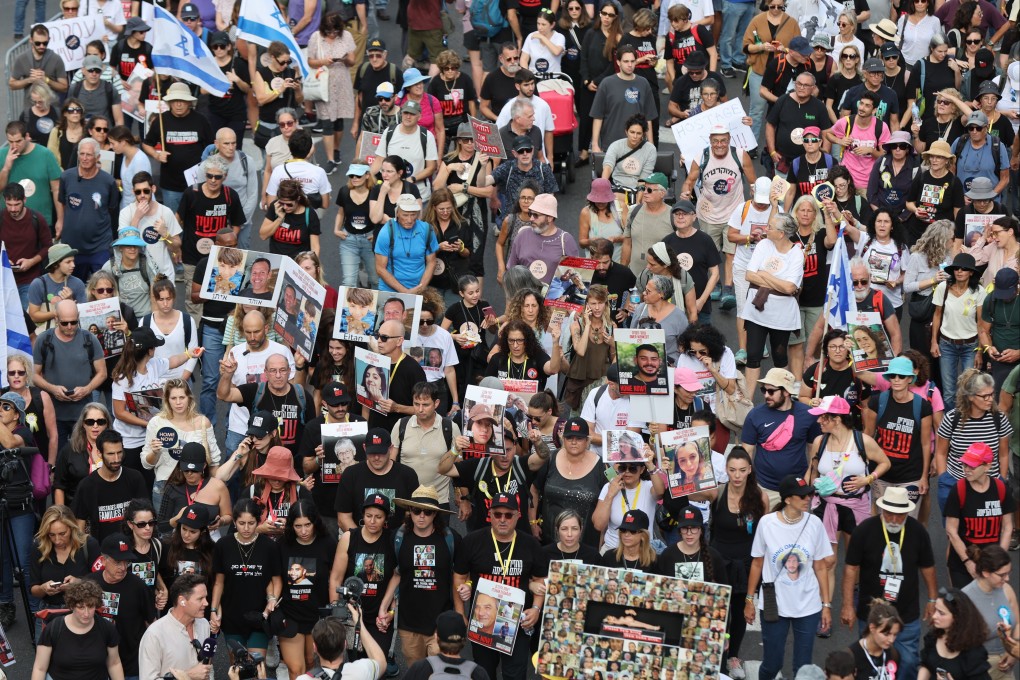Families of Israeli hostages held by Hamas in Gaza march during a rally, in Tel Aviv, Israel, on Tuesday. Photo: EPA-EFE