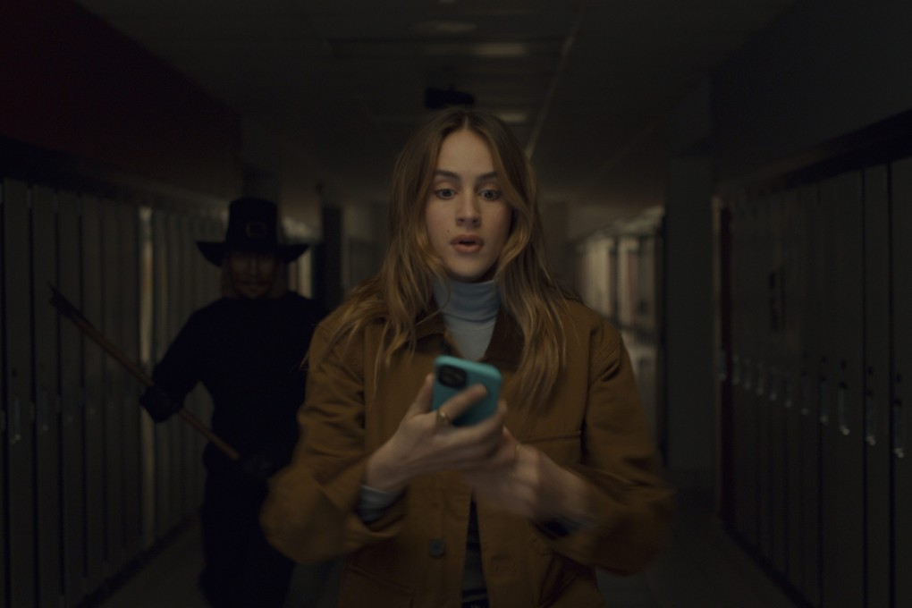 Nell Verlaque in a still from “Thanksgiving” (category III). Patrick Dempsey co-stars, Eli Roth directs.