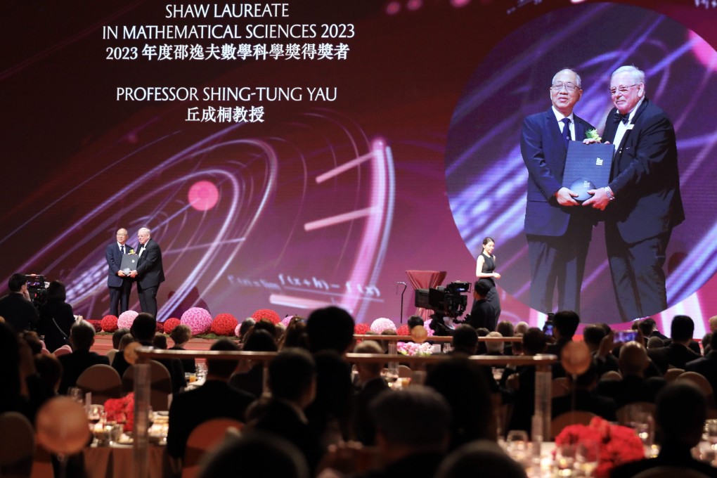 Professor Yau Shing-Tung (left) on stage receiving his award earlier this week. He says AI and mathematics will work in hand in hand to solve problems. Photo: Xiaomei Chen