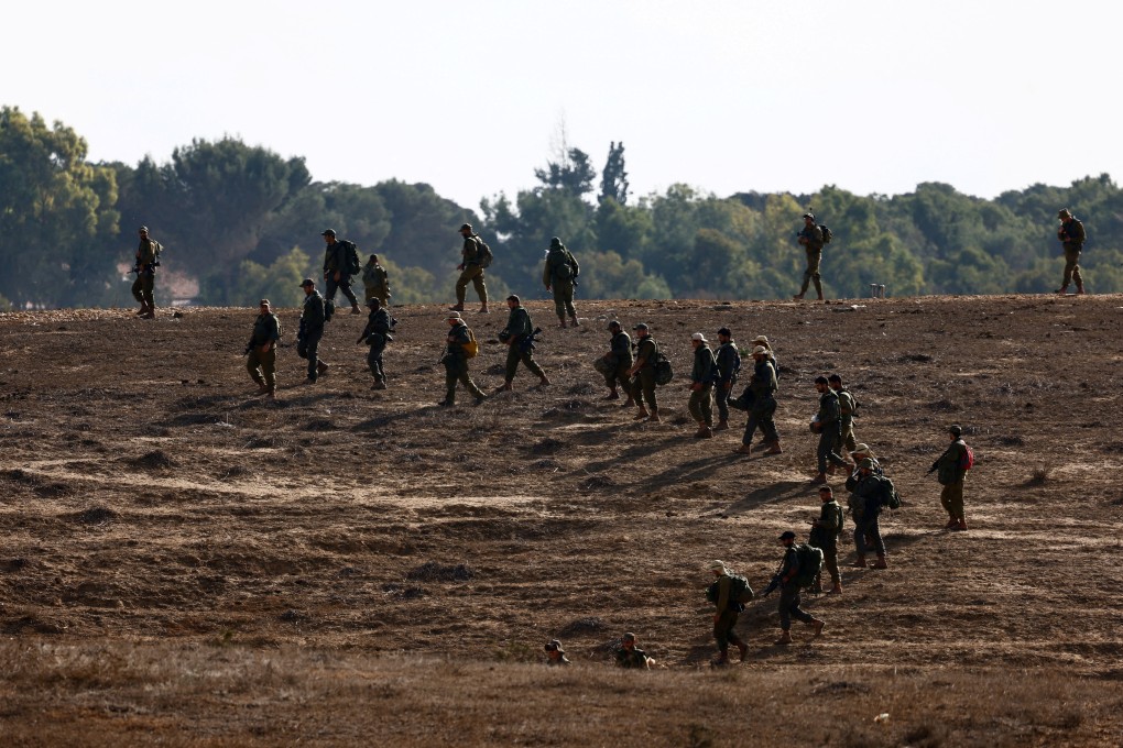 Israeli soldiers patrol an area on the Israeli side of the Israel- Gaza border. Photo: Reuters