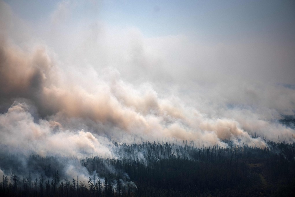 A forest fire in Siberia on July 27, 2021. The spike in wildfires is concentrated in uninhabited boreal forests like this, which store between 30 and 40 per cent of all land-based carbon. Photo: AFP