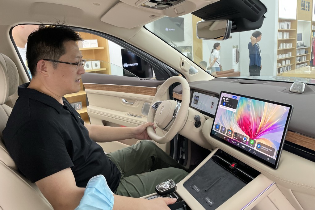 A M7 SUV developed by Aito, Huawei’s EV brand, is displayed in a shop of the telecoms equipment giant in Beijing, in this file photo from September. Aito says it received 90,000 orders for the SUV just two months after it hit the market. Photo: Simon Song