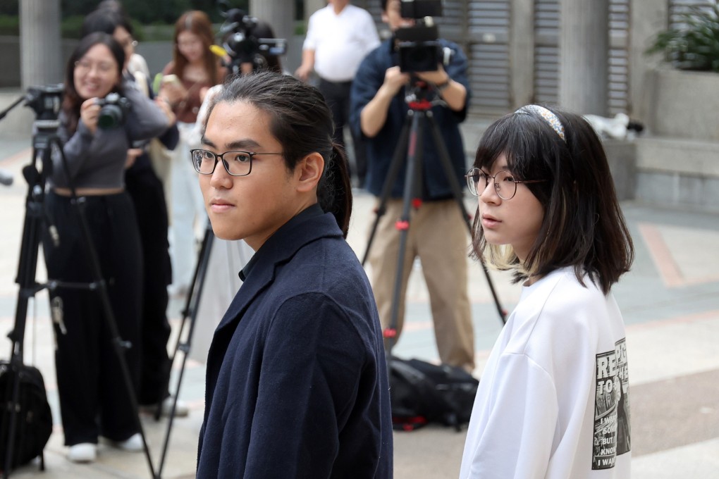 Ecarret Wong and Nathan Lam meet the media after filing their hair discrimination claims in Wan Chai. Photo: Edmond So