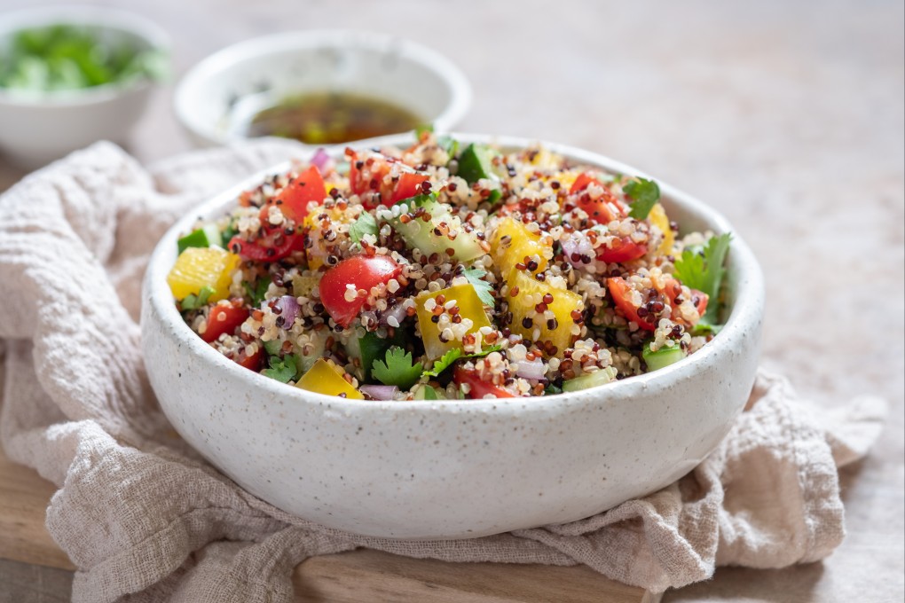 Fresh quinoa tabbouleh salad with tomatoes, peppers and cucumbers. Photo: Shutterstock