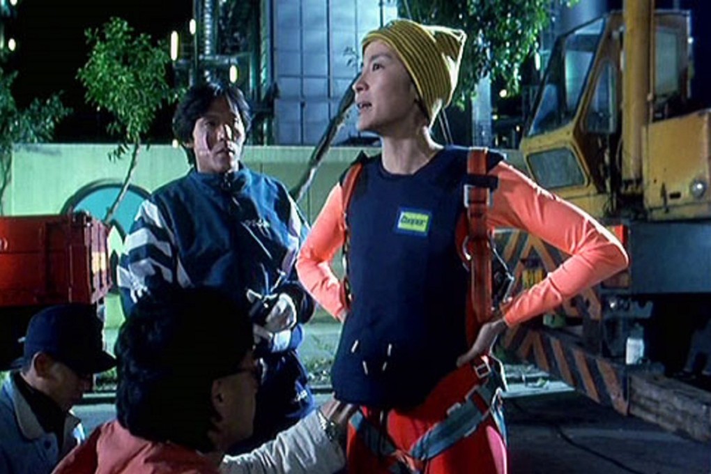 Michelle Yeoh (right) in a still from “Ah Kam”. The film, directed by Ann Hui and starring Michelle Yeoh as a stuntwoman and Sammo Hung as her boss, was seen as somewhat experimental for its mix of realistic drama, melodrama and triad action.
