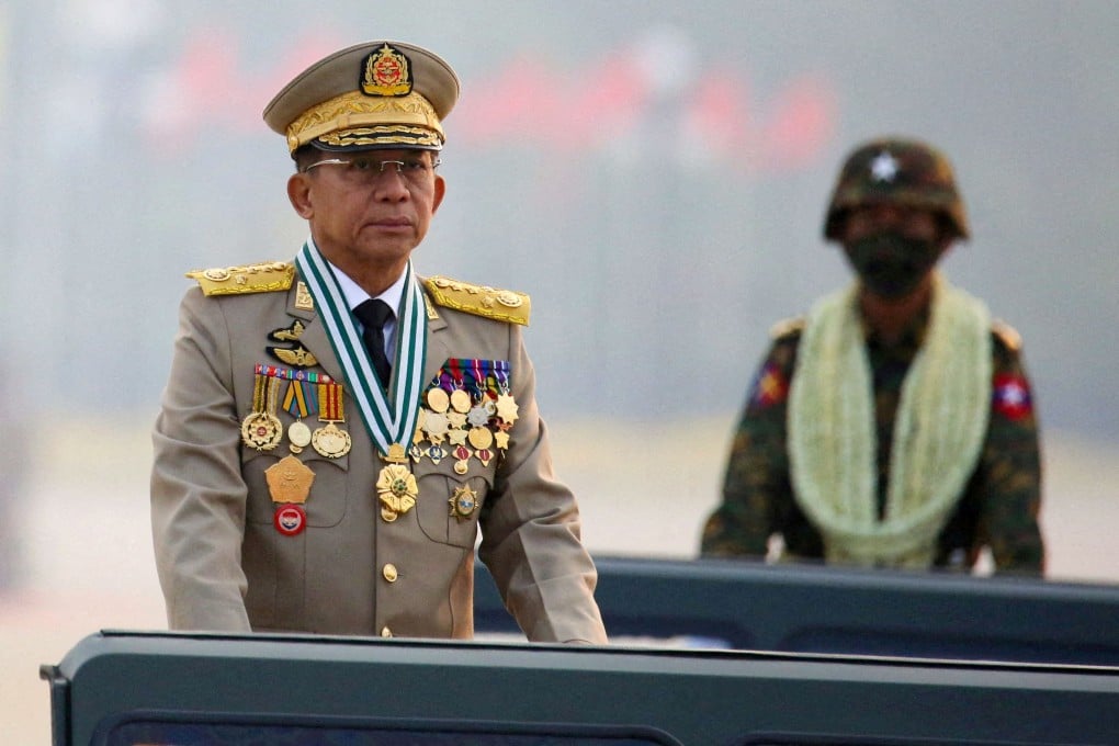 Myanmar’s junta leader General Min Aung Hlaing at an army parade in 2021. Two of his confidantes have been purged for corruption. Photo: Reuters