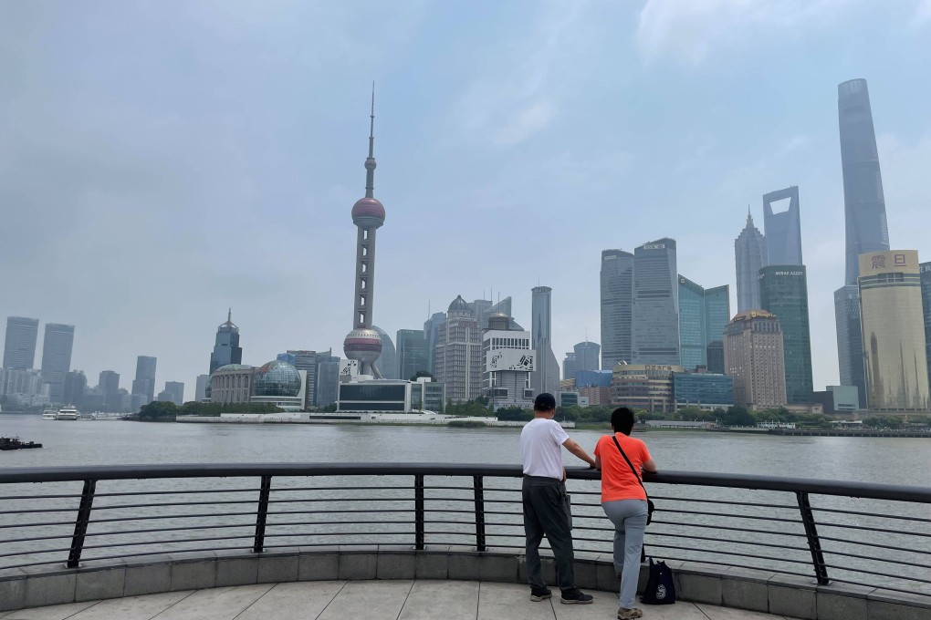 A view of the Lujiazui financial district from The Bund in Puxi, on the western bank of the Huangpu River that cuts through Shanghai. Photo: Tracy Qu