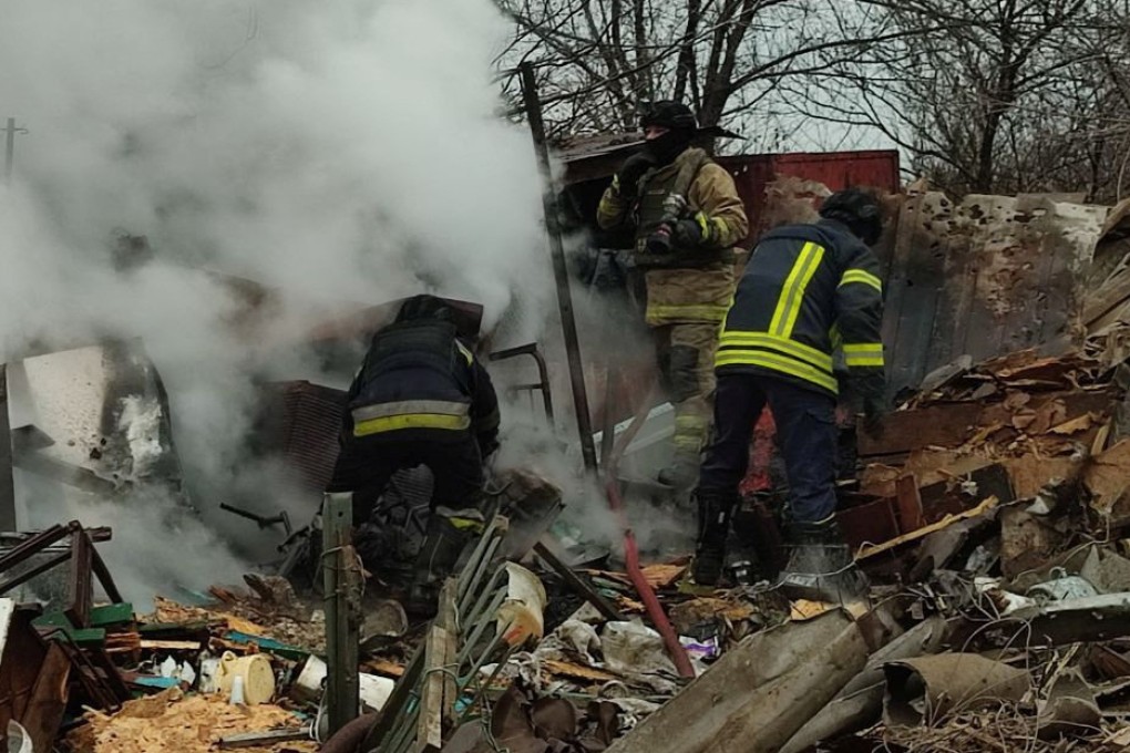 Firefighters work at the site where houses were damaged by a Russian drone strike. Photo: Press service of the State Emergency Service of Ukraine Handout/Reuters